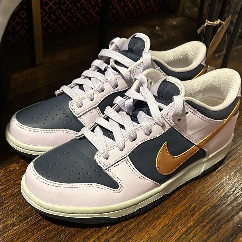 Nike Dunk Low in Navy and Gold Accents